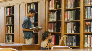 Students reading at the library.